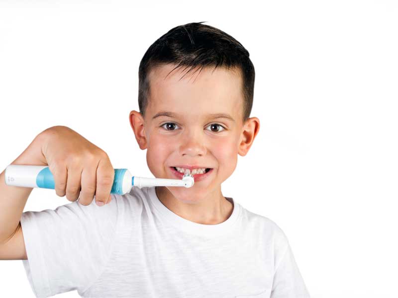 Little Boy is Brushing His Teeth
