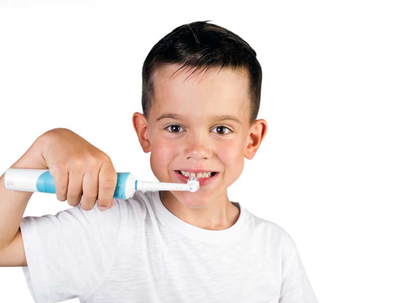 Boy is Brushing His Teeth